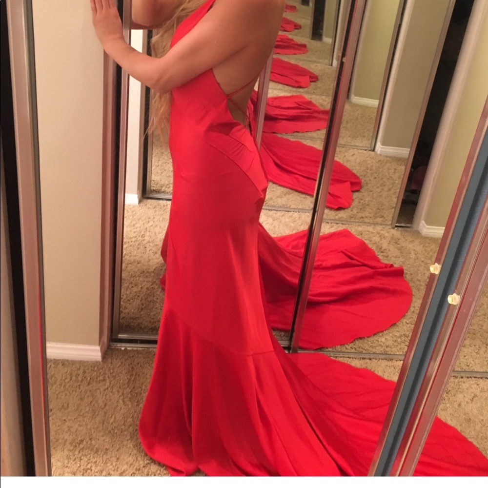 Red plunge gown with train, open back